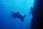 Silhouette of an underwater photographer, Sulawesi, Indonesia