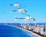 Aerial with helicopters - Photo and text courtesy of Tourism QLD