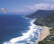 Hangglider over Stanwell Park - Photo courtesy of Tourism NSW